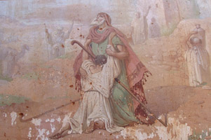 Возвращение блудного сына - картина на левой стене. Видны следы от пуль.